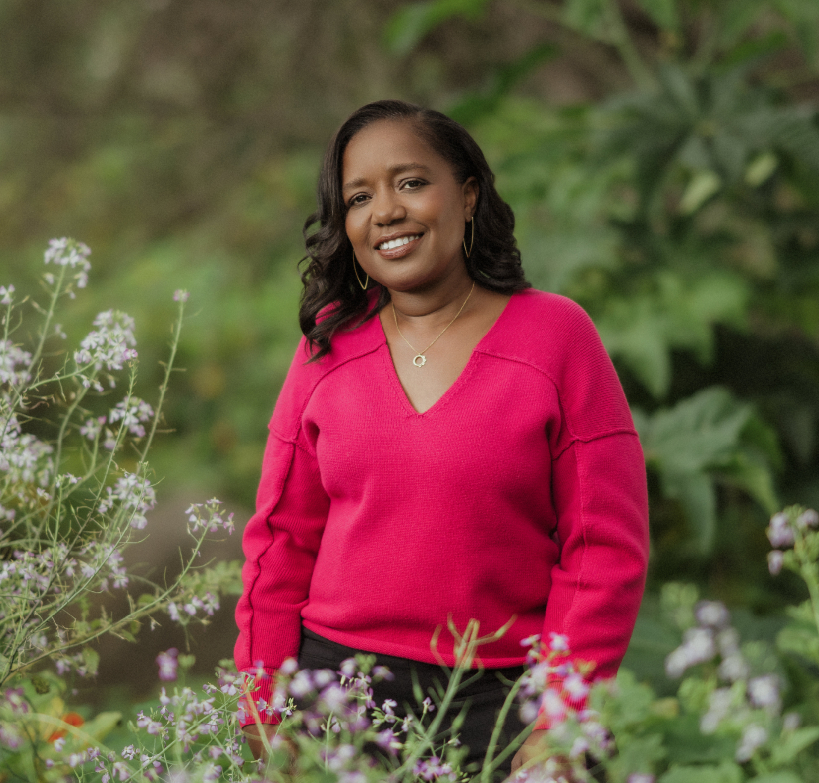 Kommah McDowell posing with greenery background