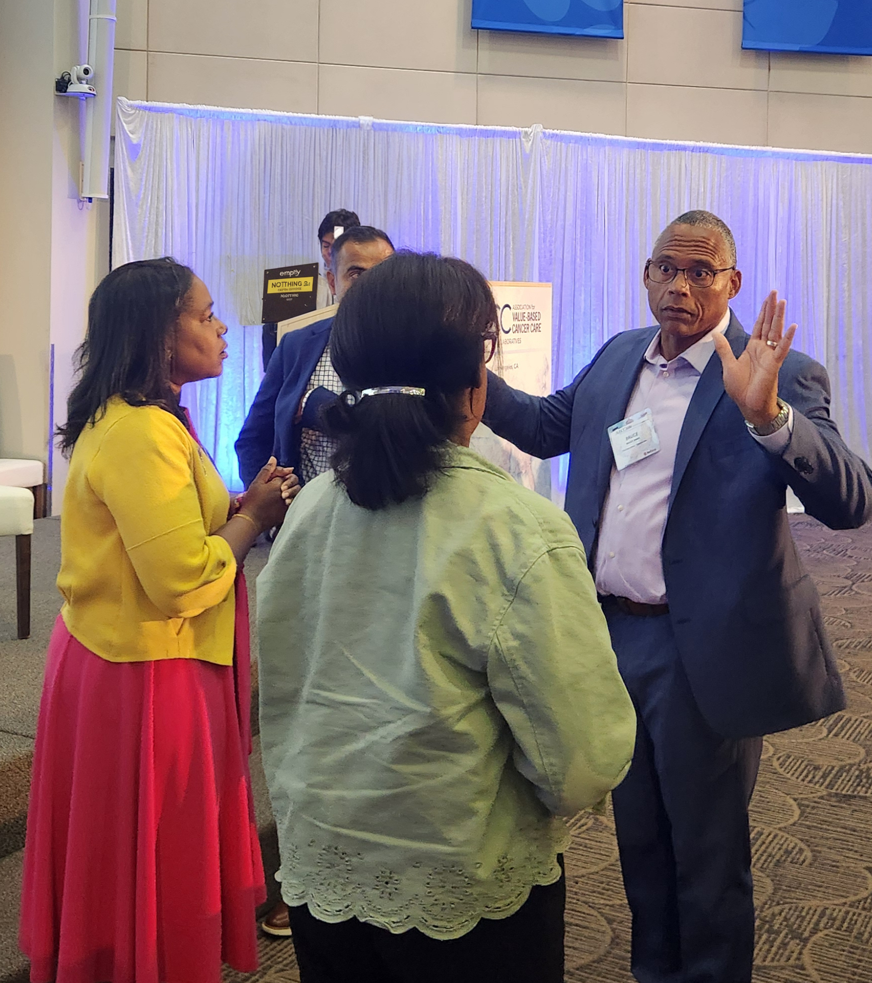 Kommah in conversation with AVBCC attendees after a panel